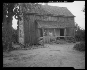 Tenant family with six children who are rural rehabilitation clients of the Farm Security Administration. Greene County, Georgia