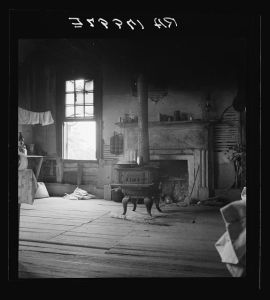 Interior of plantation house now vacant but for two rooms occupied by an old Negro couple. Negro tenants, Greene County, Georgia