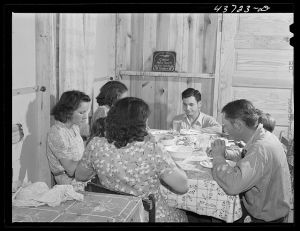 Dinner time at the family of Levy Usher at Hazlehurst Farms. Hazlehurst, Georgia