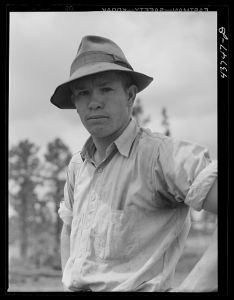 [Untitled photo, possibly related to: James Butler, one of the farmers who moved out of the Camp Stewart area to Hazlehurst Farms Inc. He was clearing land at twenty-five cents an hour. Hazlehurst, Georgia]