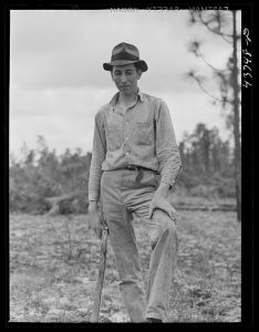 Terry Hendricks, farmer who moved out of the Hinesville Army camp area to one of the prefabricated houses at Hazlehurst Farms Inc. Hazlehurst, Georgia