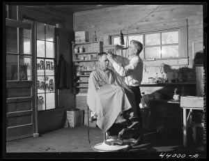 Mr. J. H. Parham, barber and notary public, in his shop in Centralhatchee, Heard County, Georgia