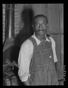 Negro farmer who was sharpening plow points in a new vocational school in Greene County, Georgia