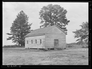 Exterior of old church also used for school. Flint River Farms, Georgia