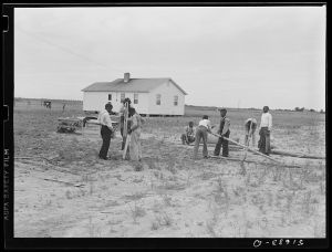 Group of sixth and seventh grade boys constructing poultry yard fence. They built the brooder in shop class at school. Flint River Farms, Georgia