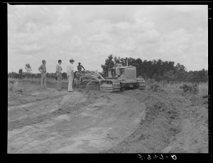[Untitled photo, possibly related to: FSA (Farm Security Administration) supervisors watching terracing of client's land. Greene County, Georgia]