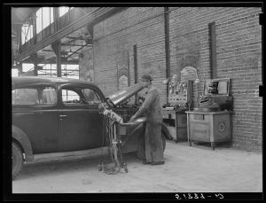[Untitled photo, possibly related to: Testing motors of car in FSA (Farm Security Administration) warehouse depot. Atlanta, Georgia]