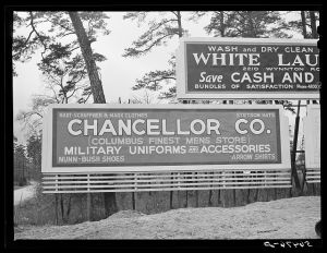 Signs on highway from Fort Benning to Columbus, Georgia