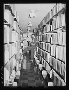 Atlanta University, Atlanta, Georgia. Students in library stacks