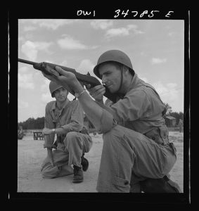 [Untitled photo, possibly related to: Warner Robins, Georgia. Air Service Command, Robins Field. Learning to handle a carbine]