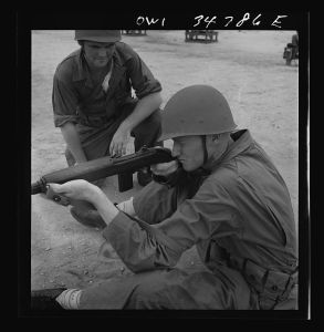 [Untitled photo, possibly related to: Warner Robins, Georgia. Air Service Command, Robins Field. Learning to handle a carbine]