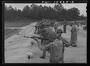 [Untitled photo, possibly related to: Warner Robins, Georgia. Air Service Command, Robins Field. Learning marksmanship with the carbine]