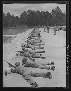 [Untitled photo, possibly related to: Warner Robins, Georgia. Air Service Command, Robins Field. Learning marksmanship with the carbine]