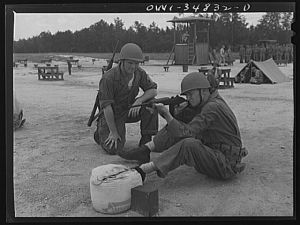 [Untitled photo, possibly related to: Warner Robins, Georgia. Air Service Command, Robins Field. Learning marksmanship with the carbine]