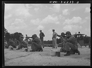 [Untitled photo, possibly related to: Warner Robins, Georgia. Air Service Command, Robins Field. Learning marksmanship with the carbine]