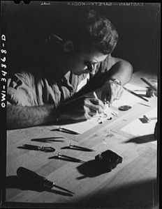 [Untitled photo, possibly related to: Warner Robins, Georgia. Air Service Command, Robins Field. Staff Sergeant C.A. Jones, an instrument repair man, working on an aircraft clock. Sergeant Jones comes from Lloyd, Florida]