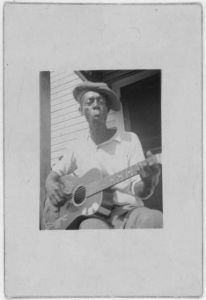 [Bill Tatnall, with guitar, Frederica, Georgia]