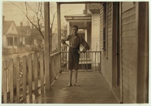 Charlie Lambert 15 now (he says) been in mill work 8 years. Went into mill in Columbia, S.C. at 7 years old, in Granby Mill. (See photo 557). Location: Augusta, Georgia.
