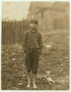 Neil Power, 10 y[ea]rs old, said, "Turns stockings in Rome (Ga.) Hosiery Mill." A shy pathetic figure. "Haint been to school much." Location: Rome, Georgia.