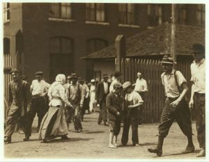 Noon hour at Massachusetts Mill, Lindale, Ga. During the days following this, I proved the ages of nearly a dozen of these children, by gaining access to Family Records, Insurance papers, and through conversations with the children and parents, and found these that I could prove to be working now, or during the past year at 10 and 11 years of age, some of them having begun before they were ten. Further search would reveal dozens or more. (See Hine Report). Location: Lindale, Georgia.