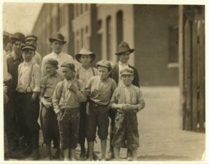 Noon hour at Massachusetts Mill, Lindale, Ga. During the days following this, I proved the ages of nearly a dozen of these children, by gaining access to Family Records, Life Insurance papers, and through conversations with the children and parents, and found these that I could prove to be working now, or during the past year at 10 and 11 years of age, some of them having begun before they were ten. Further search would reveal dozens more. (See Hine Report). Location: Lindale, Georgia.