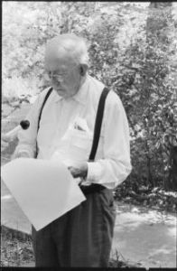 David Paulk reading riddles; Paulk's house, stuffed dolls; Ben Hill County courthouse; C.M. Copeland at woodcarving shop, Ben Hill County, Georgia