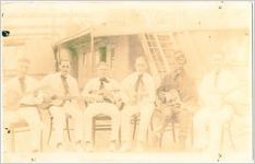 Photograph, String band aboard a submarine