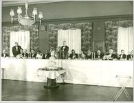 Photograph of Georgia Warm Springs Foundation medical director Robert L. Bennett speaking during the twentieth anniversary celebration of the March of Dimes, held at the Georgia Warm Springs Foundation, Warm Springs, Meriwether County, Georgia, 1958