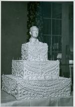 Photograph of an elaborately decorated cake capped with a bust of Franklin Delano Roosevelt made for a President's Birthday Ball celebration and fundraiser at the Georgia Warm Springs Foundation, Warm Springs, Meriwether County, Georgia, 1935-1945?