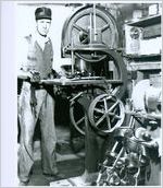 Photograph of an orthopedic brace maker using a band saw in the Warm Springs Brace Shop at the Georgia Warm Springs Foundation, Warm Springs, Meriwether County, Georgia, 1930-1940?
