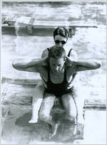 Photograph of a young man receiving physical therapy in the pool at the Georgia Warm Springs Foundation, Warm Springs, Meriwether County, Georgia, 1930-1940?