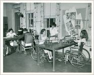Photograph of four patients working on craft projects as part of their therapeutic treatment program at the Georgia Warm Springs Foundation, Warm Springs, Meriwether County, Georgia, 1945-1955?