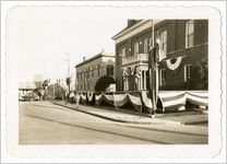 Photograph of downtown Sylvania decorated with American flags, Sylvania, Georgia, 1947
