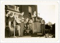 Photograph of Roy Acuff addressing the crowd at Sylvania Centennial celebration, Sylvania, Georgia, 1947