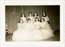 Photograph of eight women wearing ball gowns, Sylvania, Georgia, 1947