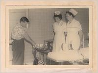 Photograph of doctor demonstrating operating room equipment to nurses at Screven County Hospital, Sylvania, Georgia, 1951