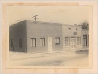 Photograph of storefront along a street, Sylvania, Georgia, 1951