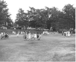 Children playing "ring around the Rosie"