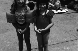 Two girls next to the CEA Pool