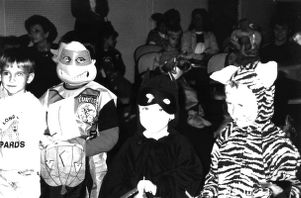 Children in Halloween costume at Coleman Library