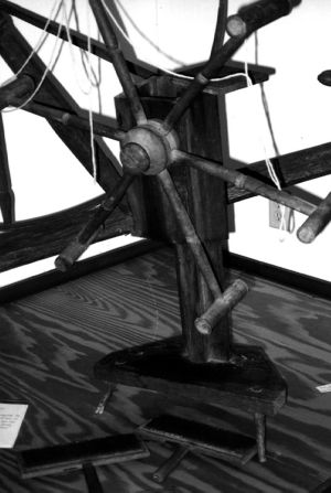 An antique yarn winder on display at Coleman Library