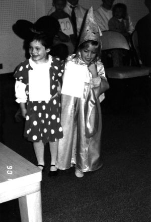 Two little girls in Halloween costumes