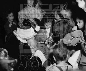 Children and adults with Santa Claus at CEA