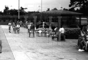 People sitting next to the CEA Pool