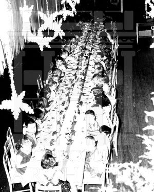 CEA Kindergarten students at long table