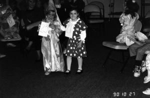 Two little girls in Halloween costumes