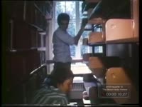Series of WSB-TV newfilm clips from the Pitts Theology Library at Emory University showing workers and librarians unloading boxes of books and re-shelving them, probably between October and November of 1976