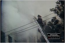 Apartment Fire Controlled by Firemen; Dense Smoke on Peachtree Road; Water Damage