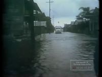 BLACK FAMILIES LEAVE HOMES TO AVOID FLOOD WATERS (NO DATE)