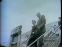 Series of WSB-TV newsfilm clips of President Dwight D. Eisenhower arriving in Augusta, Georgia for the Masters Golf Tournament, 1957 April 9